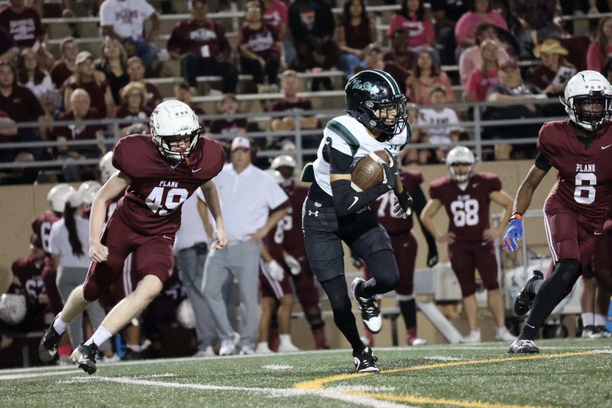 After a hold from Plano's offense, senior Blake Summers successfully intercepts the ball and runs to a first down. Summers plays cornerback for the Eagles. "I think I produced pretty good," Summers said. "Learning through all the defense, routes, and placement; we came out with a win."